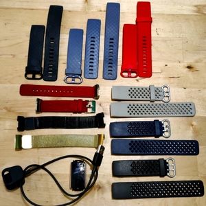 FitBit Charge 3 in rose gold with charger and bands